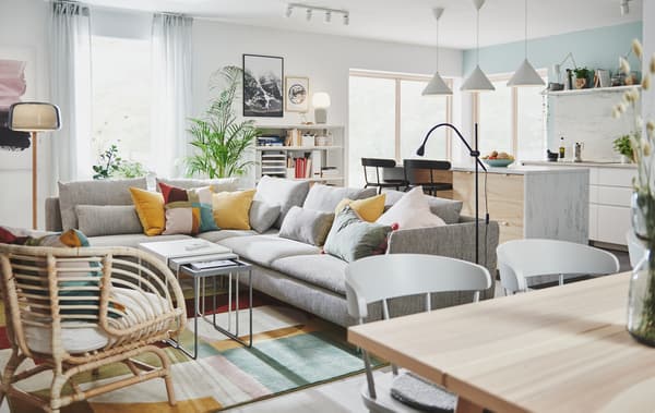 Link to 'When style meets storage' - image of a large space with kitchen area and living room/