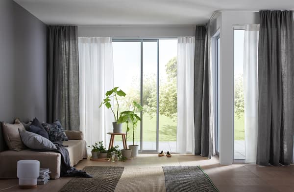 Living room with doors open to the garden.