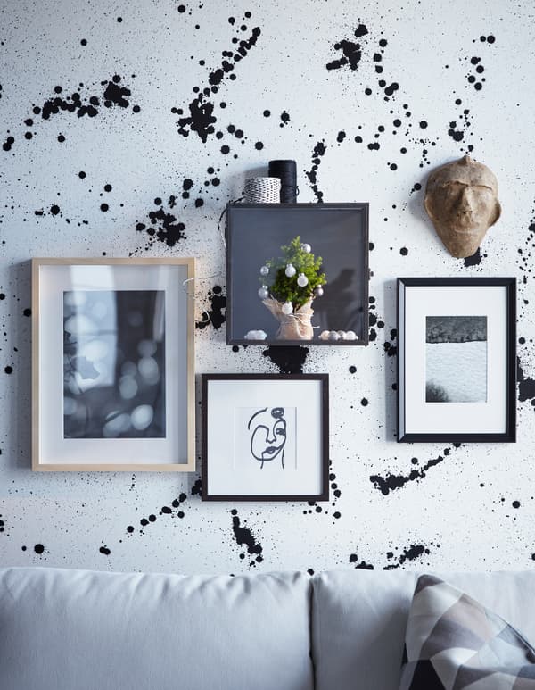 Living small BUT still want a tree this holiday? Save space with a mini tree. Just put it a display box on the wall. IKEA has lots of space-saving furniture such as BARKHYTTAN display box.