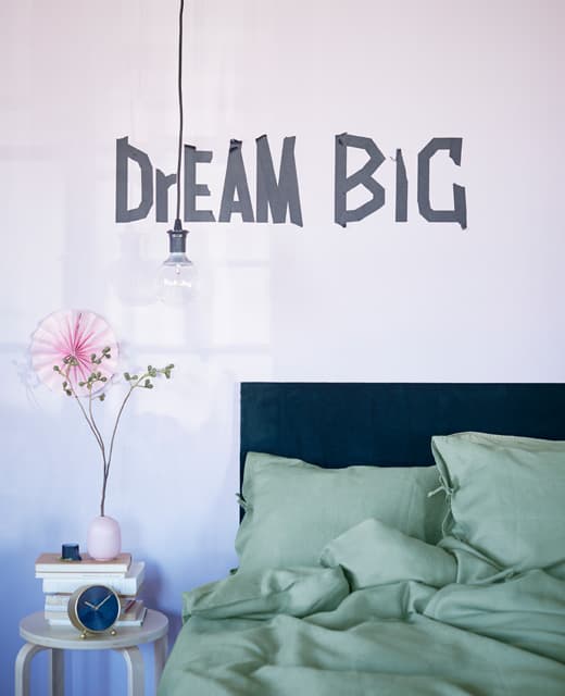 Looking for new home ideas and affordable furniture? Here we used black tape to write a quote on a bedroom wall. IKEA has a lot of different tapes such as IKEA GIVANDE black tape. Updating with washi tape is an easy do it yourself trick.