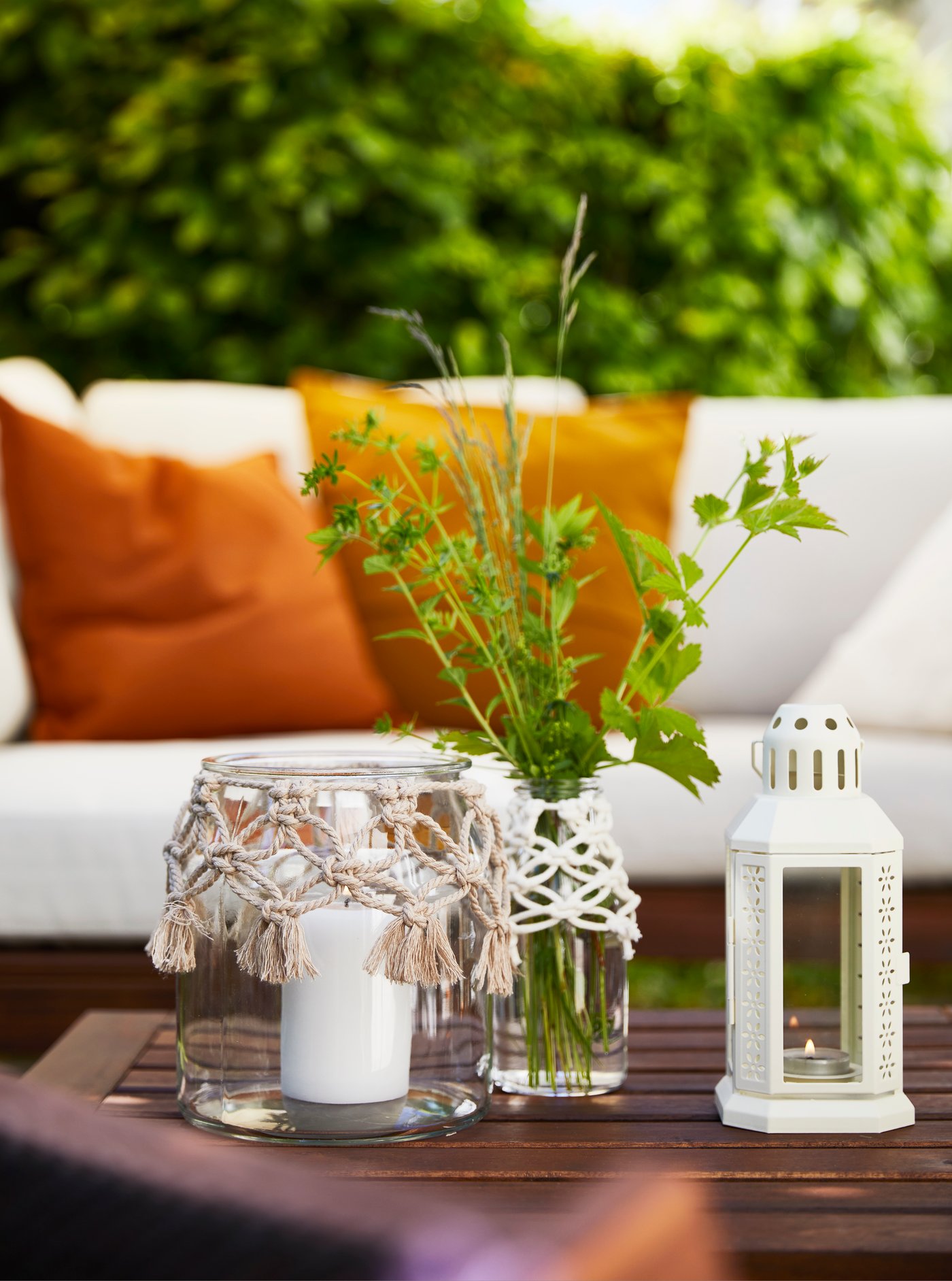 Macramé on vase and white lantern