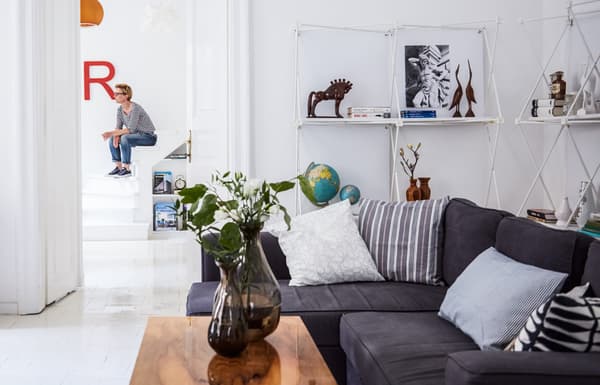 Make a small space look bigger with white walls and floors.