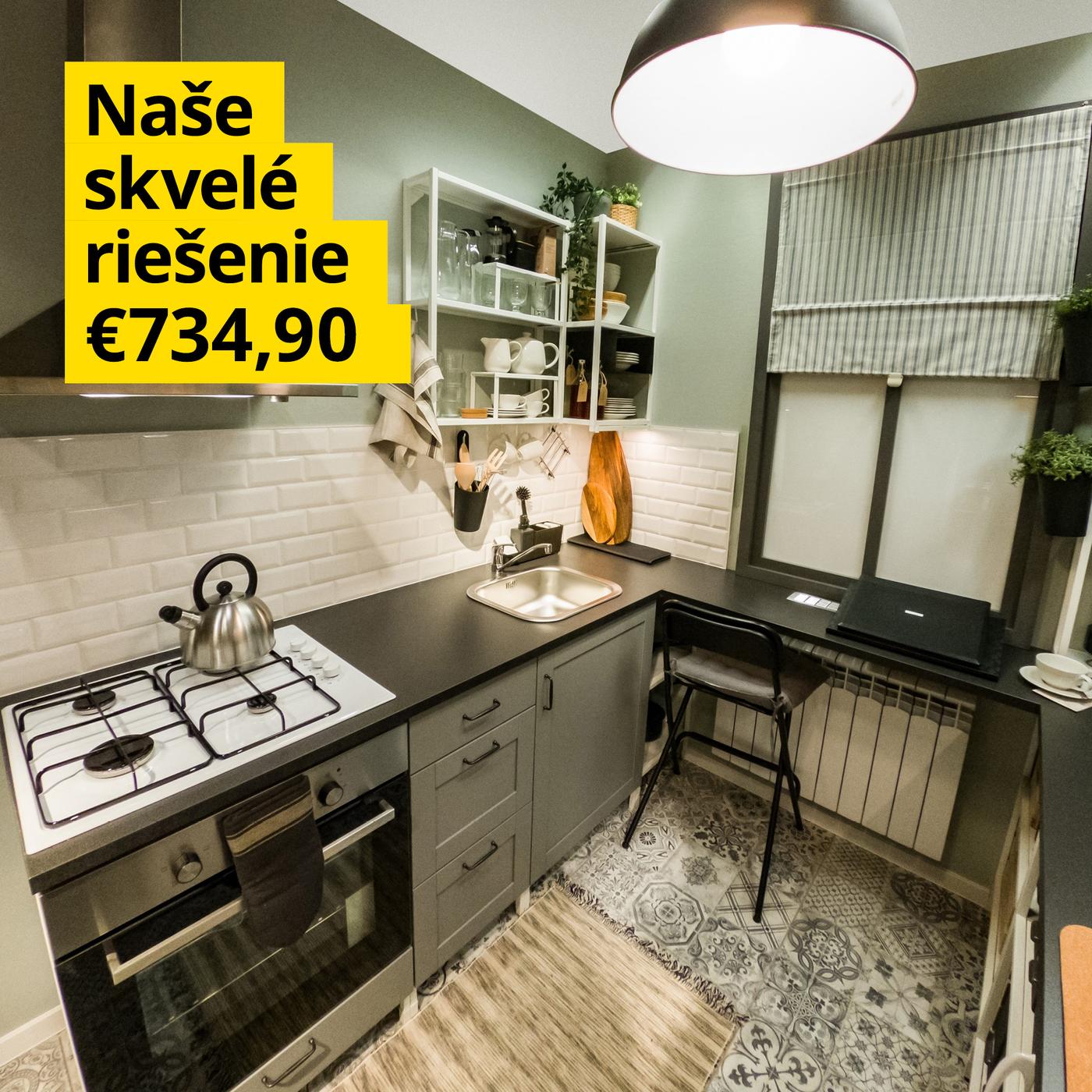 Malá kuchyňa bez kompromisov v sivo-čiernej farbe.