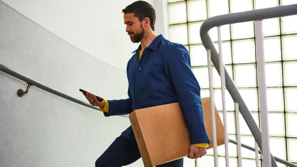 man walking up stairs