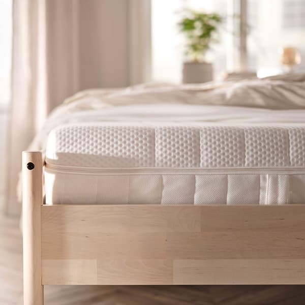 Mattress on bed frame