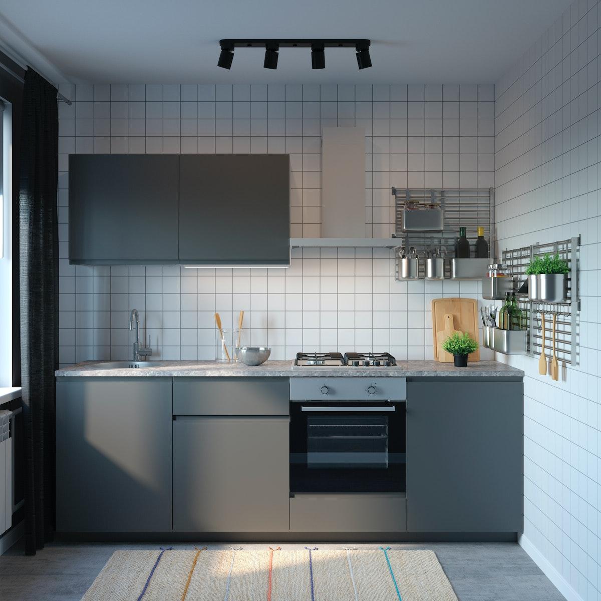 METOD kitchen with VOXTORP dark grey fronts.