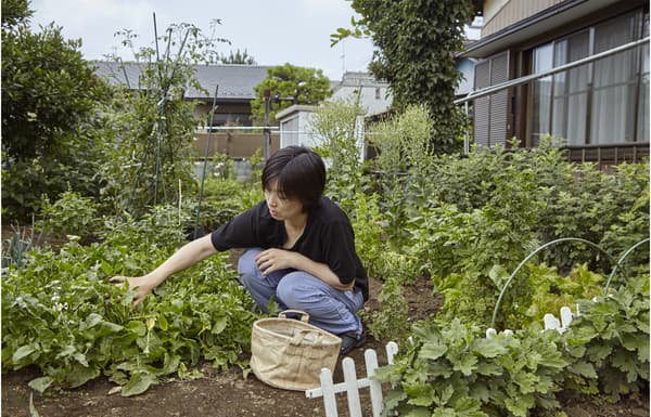 Minako tending her vegetable garden