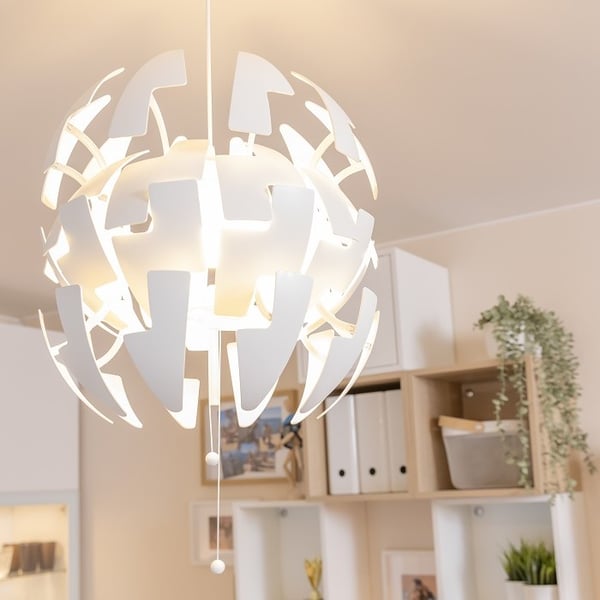 Modern pendant light fixture with geometric white design.