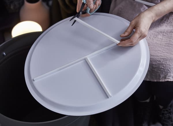 MONTERA strips are placed on the underside of a tray.