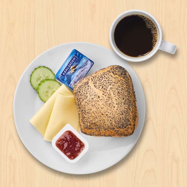 Morgenmadstallerken
Rundstykke med 2 skiver ost, 1 pakke jordbær­marmelade, 1 pakke Kærgården, 2 skiver agurk og 1 kop kaffe eller te

15.-