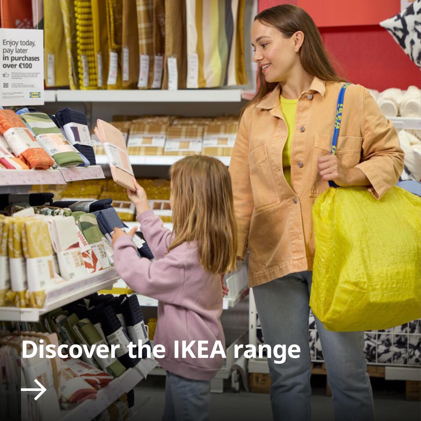 Mother and child shopping at IKEA in the textile department