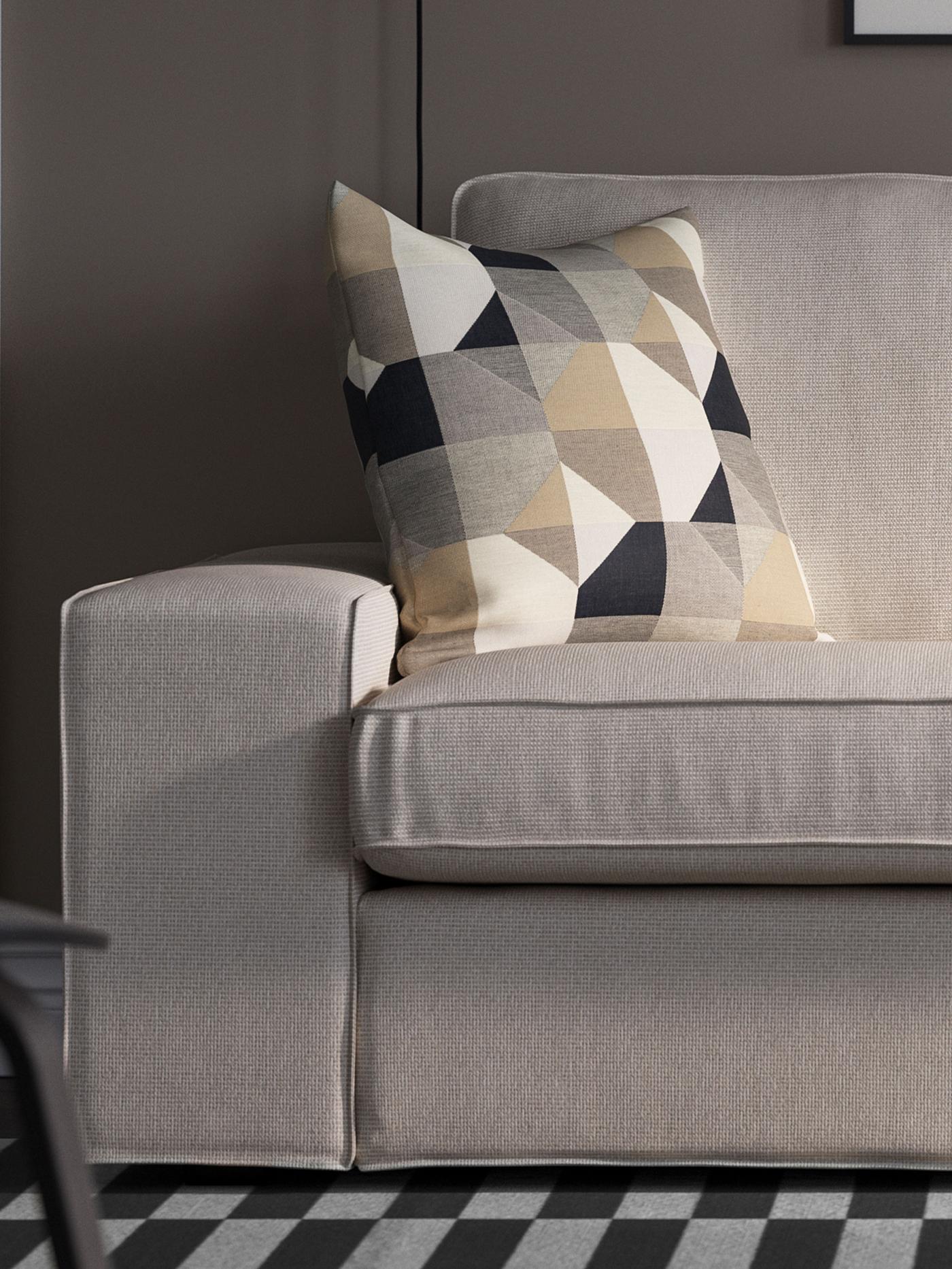 Närbild på ena sidan av en KIVIK soffa som länkar till KIVIK seriesida.