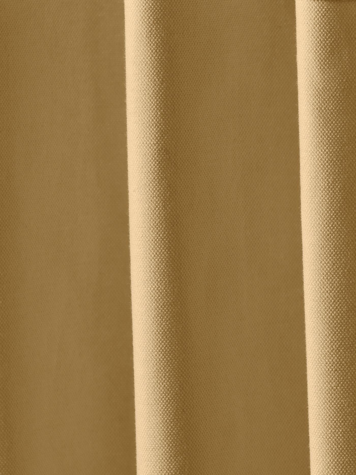 Närbild på gult gardintyg.