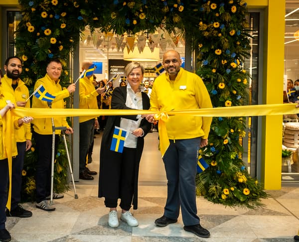 Natalia Petelina, Meeting Place Manager, Livat Hammersmith, and Pritesh Patel, Store Manager, IKEA Hammersmith in front of the opening ribbon