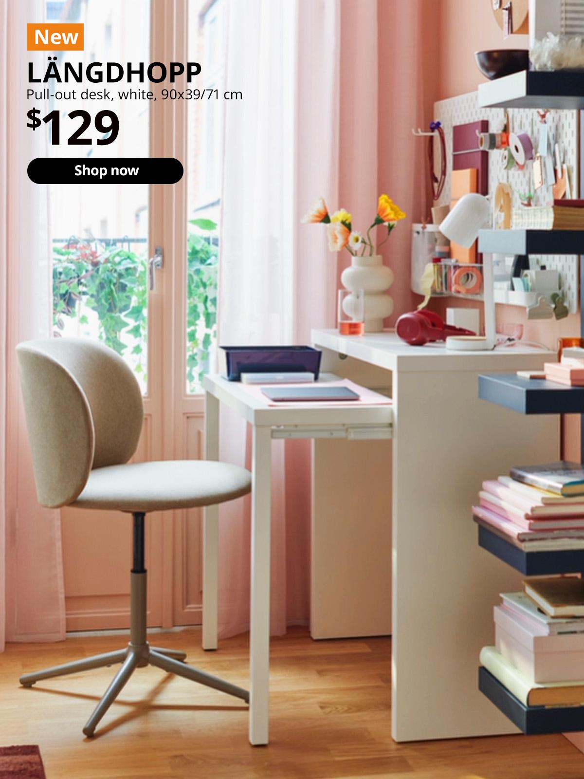 Natural light flooding into a study room in Singapore. A beige KRYLBO chair is parked in front of a white LÄNGDHOPP pull-out desk, 90x39/71 cm. Price: $129.