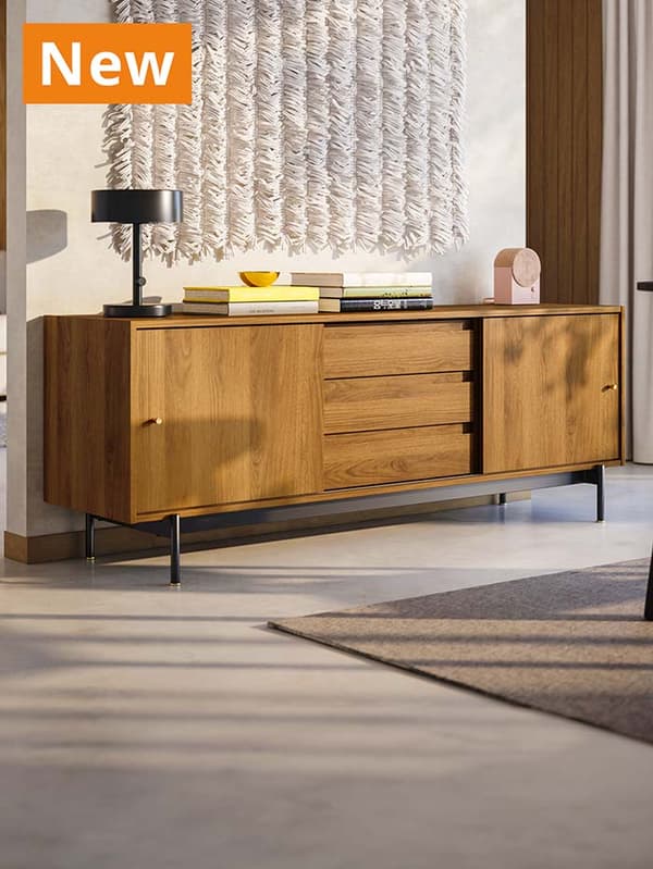 NEW IKEA product. A RÅDMANSÖ TV bench 15 kg in brown walnut effect placed in modern Scandinavian living room setting.