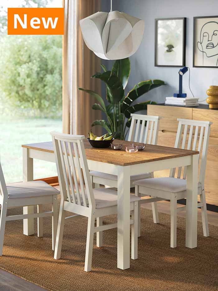 NEW IKEA product. Beige ÅLHULT dining table with four dining chairs in a dining room setting.