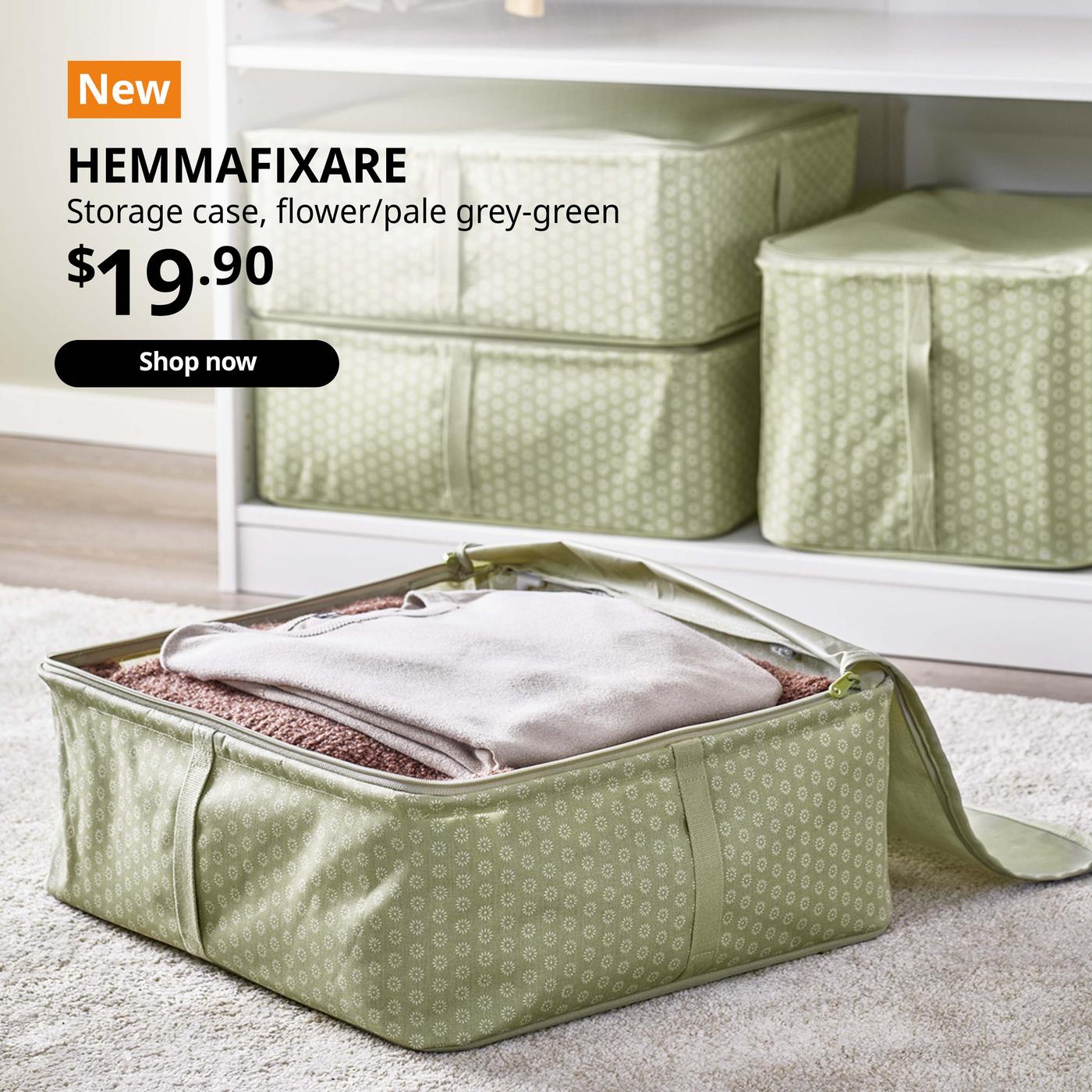 NEW IKEA Product. Clothes packed in a floral green HEMMAFIXARE storage case. Price: $19.90