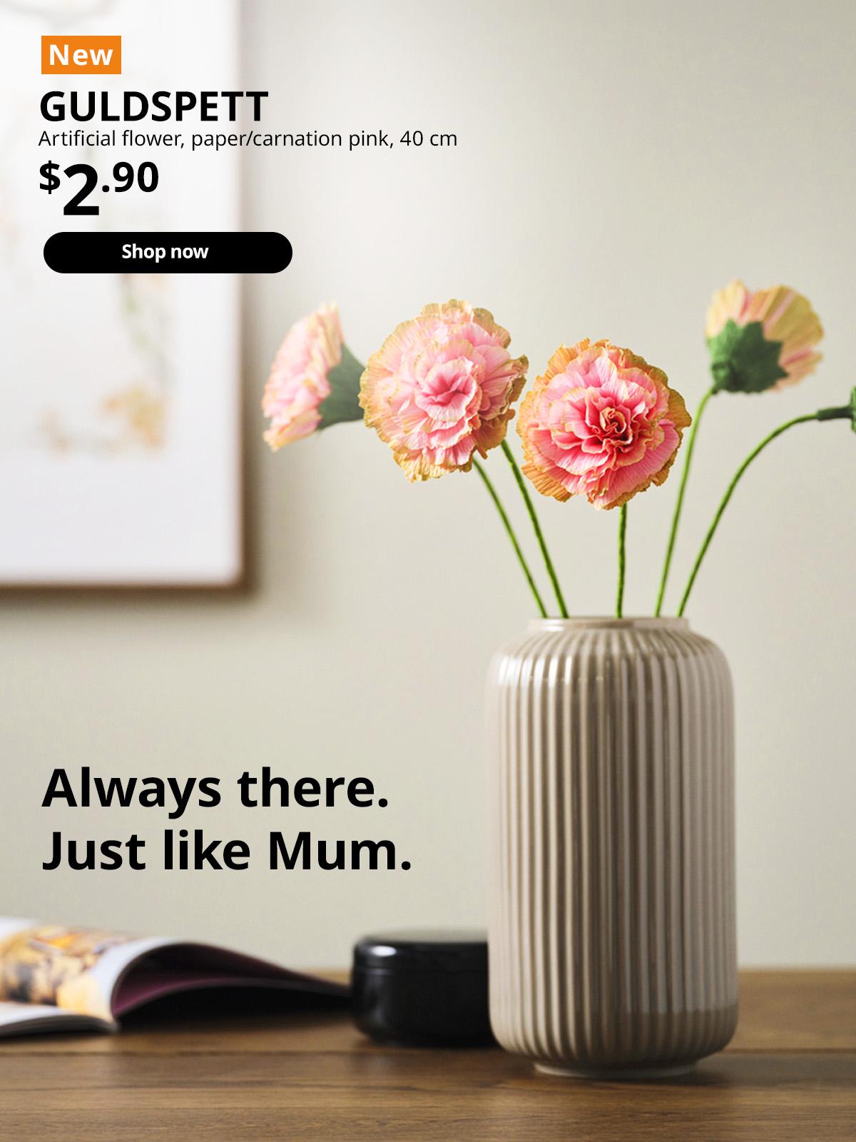 NEW IKEA product for Mother's Day. Dark grey STILREN vase featuring a bunch of GULDSPETT artificial flowers, paper/carnation pink, 40 cm. Price: $2.90. Shop now.