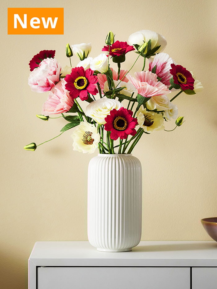 NEW IKEA product. GULDSPETT artificial flowers displayed in white STILREN vase.