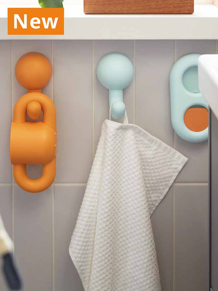 NEW IKEA product. HUMLESJÖN hook with suction cup, 8 cm, orange/turquoise in bathroom.