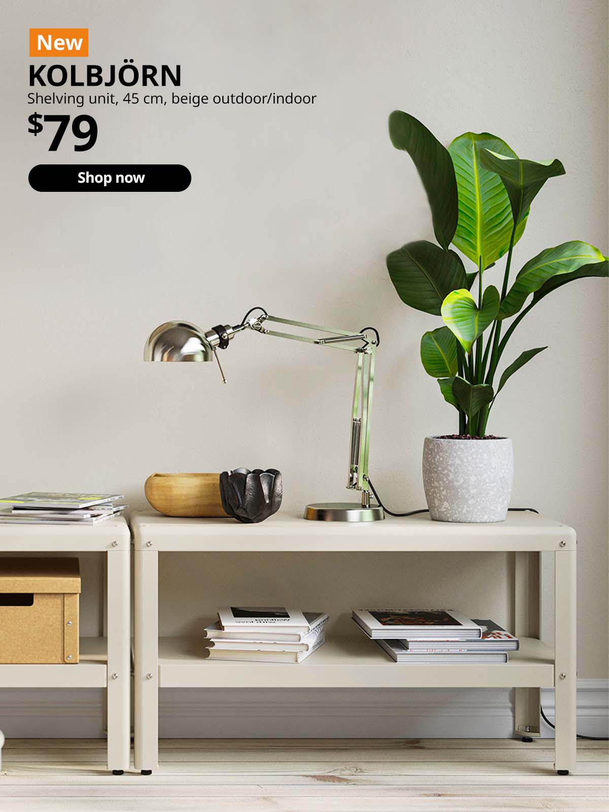 NEW IKEA product. Living room features beige KOLBJORN shelving unit, 45cm, with books and lamp and potted plant on top of it. Price: $79.