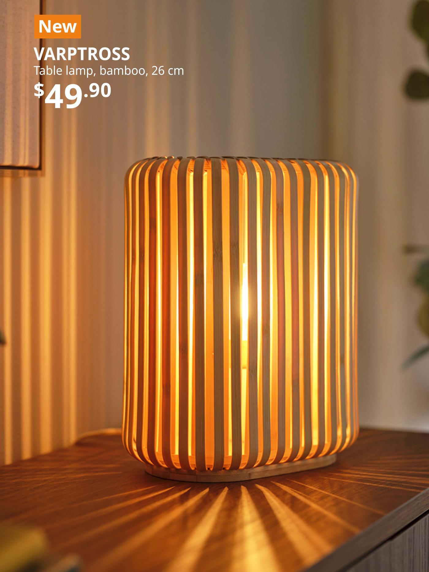 NEW IKEA product. Living room in Singapore features a lit up bamboo VARPTROSS table lamp, bamboo, 26 cm.
