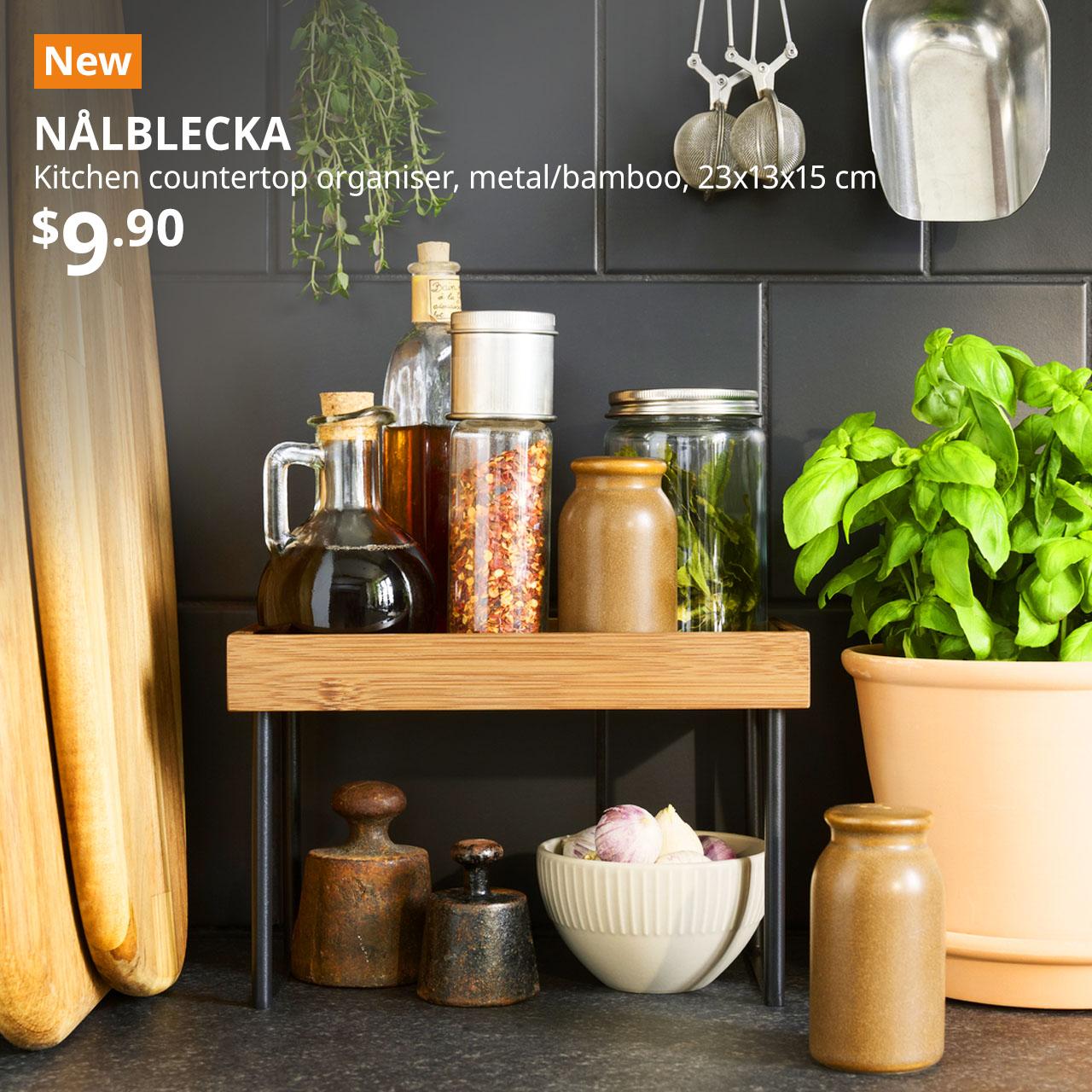 New IKEA product. NÅLBLECKA Kitchen countertop organiser, metal/bamboo, 23x13x15 cm. Price: $9.90