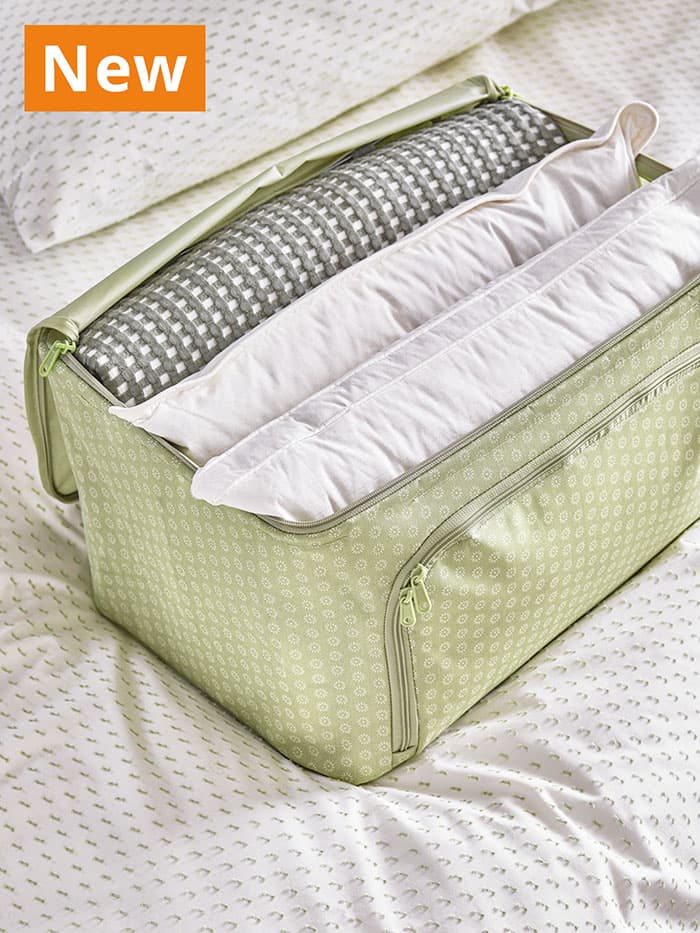 NEW IKEA product. Pillows stored in green HEMMAFIXARE storage case.