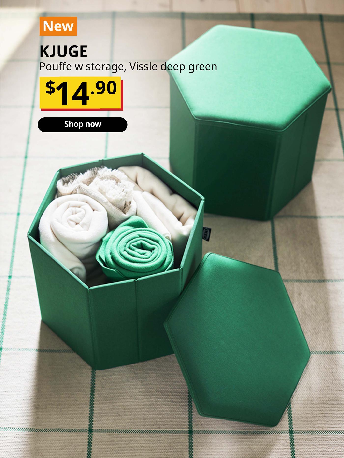 NEW IKEA product. Towels rolled up and stored in KJUGE pouffe with storage, Vissle deep green. Price: $14.90.