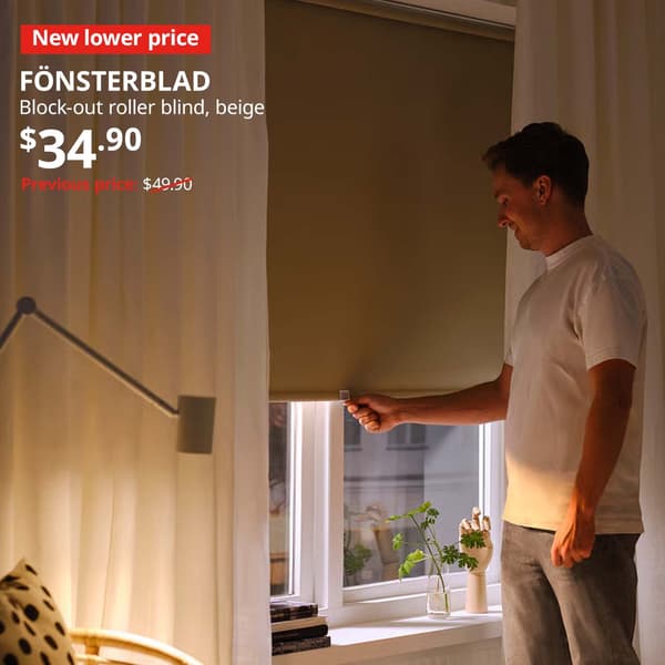 New lower price tag. Beige FÖNSTERBLAD block-out roller blind. Price: $34.90. Previous price with red slash: $49.90.