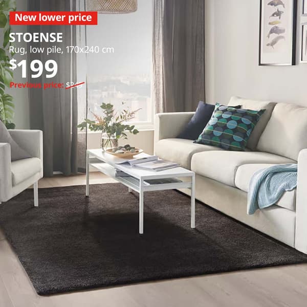 New lower price tag. White ALEX desk, 100x48 cm, in a children's study room setting in Singapore, $159. Previous price: $179.