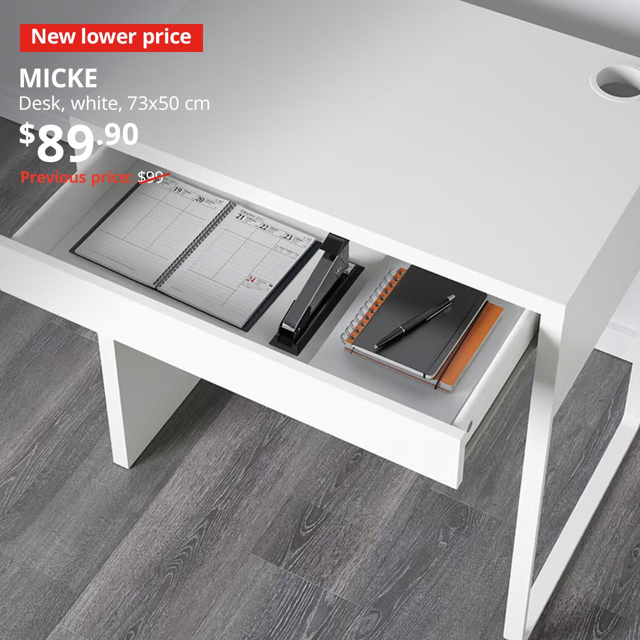 New lower price tag. White MICKE desk in a children's study room setting in Singapore, $159. Previous price: $89.90.