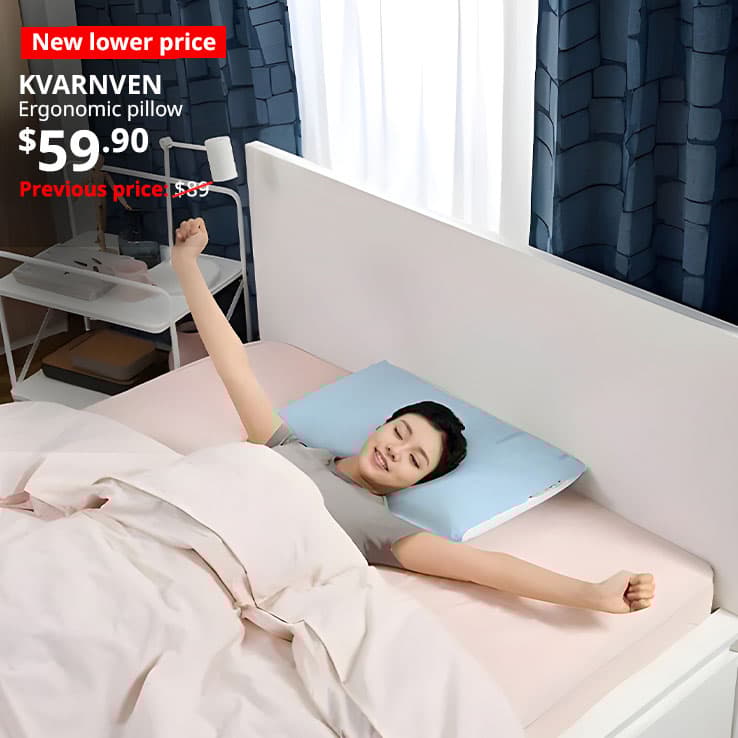 New lower price. Woman sleeps on KVARNEN ergonomic cooling pillow, $59.90.