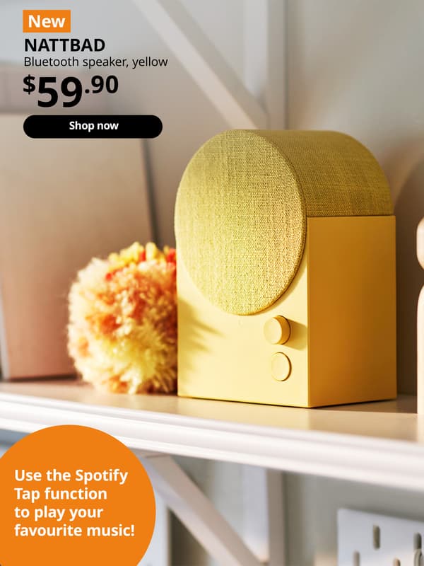 NEW product tag. Yellow NATTBAD bluetooth speaker placed on white shelf. $59.90. Shop now.