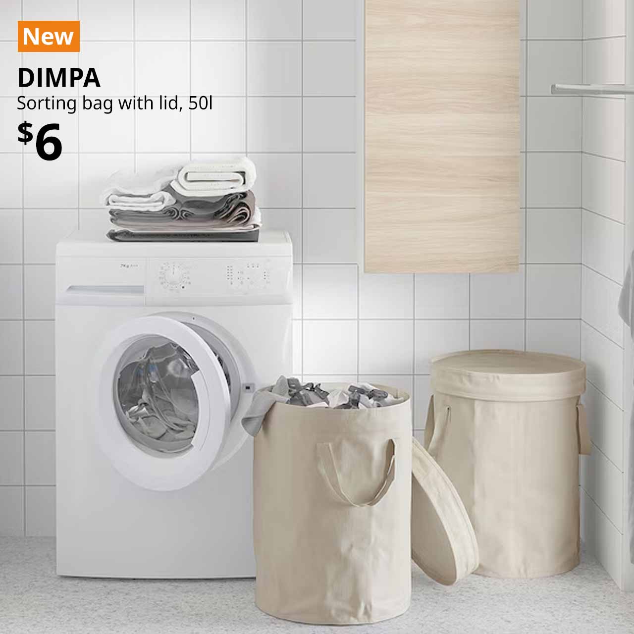 NEW tag. Two light grey-beige DIMPA sorting bags with lid beside a washing machine in the laundry room. Price: $6.