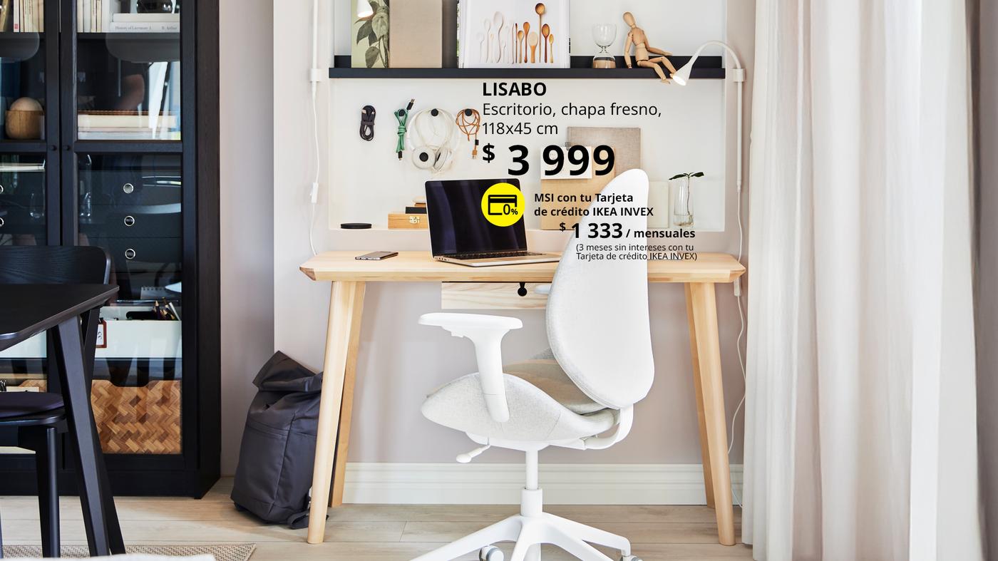 Oficina en casa con escritorio LISABO y soluciones de almacenamiento para crear un espacio de trabajo organizado y funcional.
