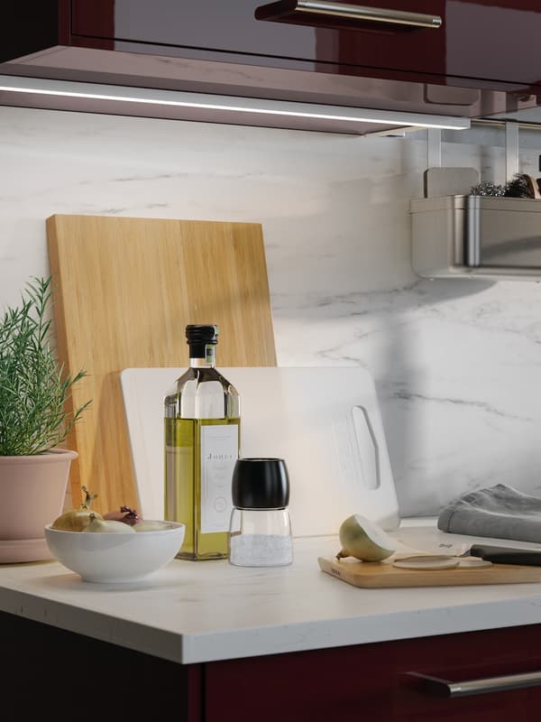 Oil and cutting board placed on the work surface 
