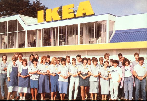 Old picture of IKEA employees in front of IKEA store