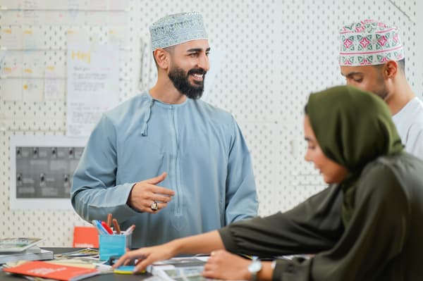 Omanis checking the IKEA catalogue.