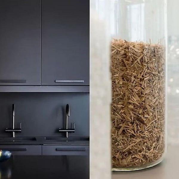 On one side black kitchen, o other sawdust