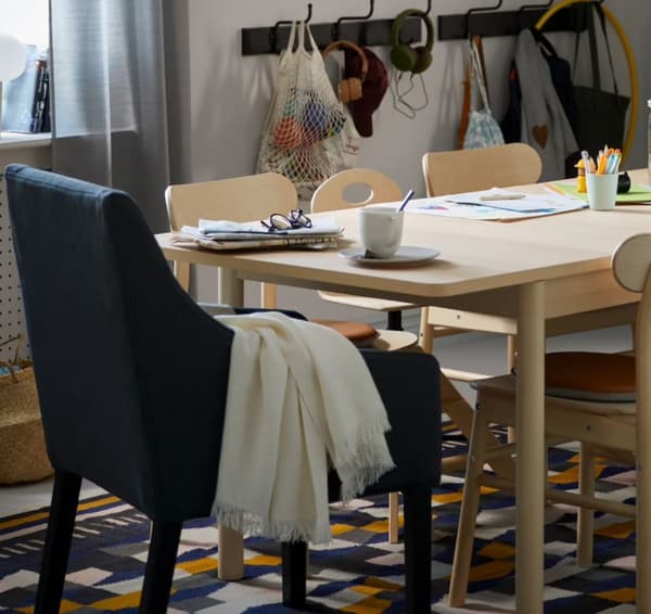 One chair next to a table.