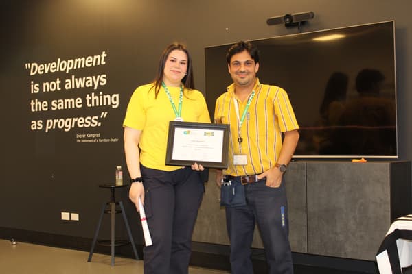 Originally from Iran, Onila and her 'buddy' Syed at her graduation from the Stand for Refugees program
