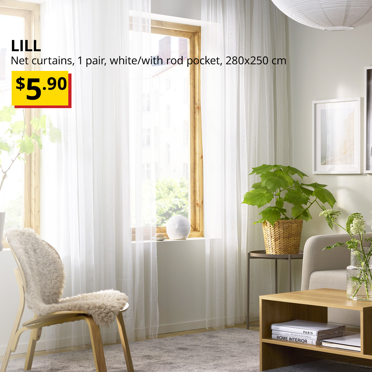 Our lowest price. LILL sheer net curtains hung on the living room window, 1 pair, white/with rod pocket, 280x250 cm