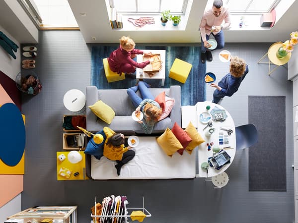 Overhead shot of people having lunch in a retail space.