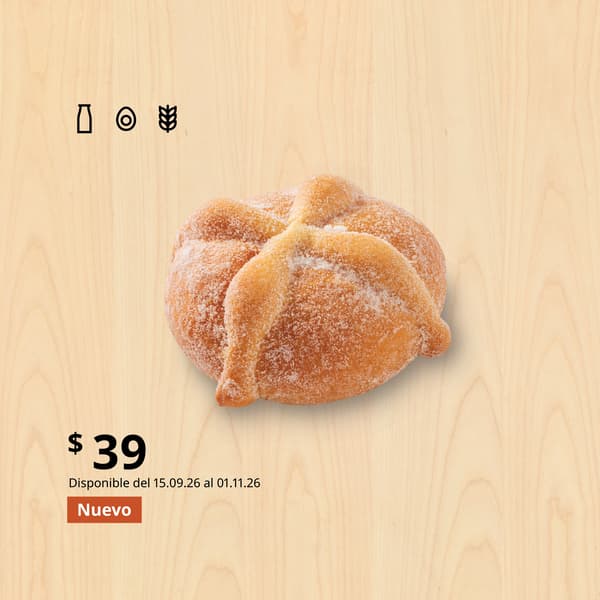 Pan de muerto tradicional con fondo de madera