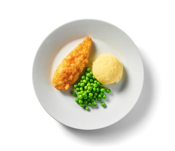 Panerad kyckling på en tallrik.