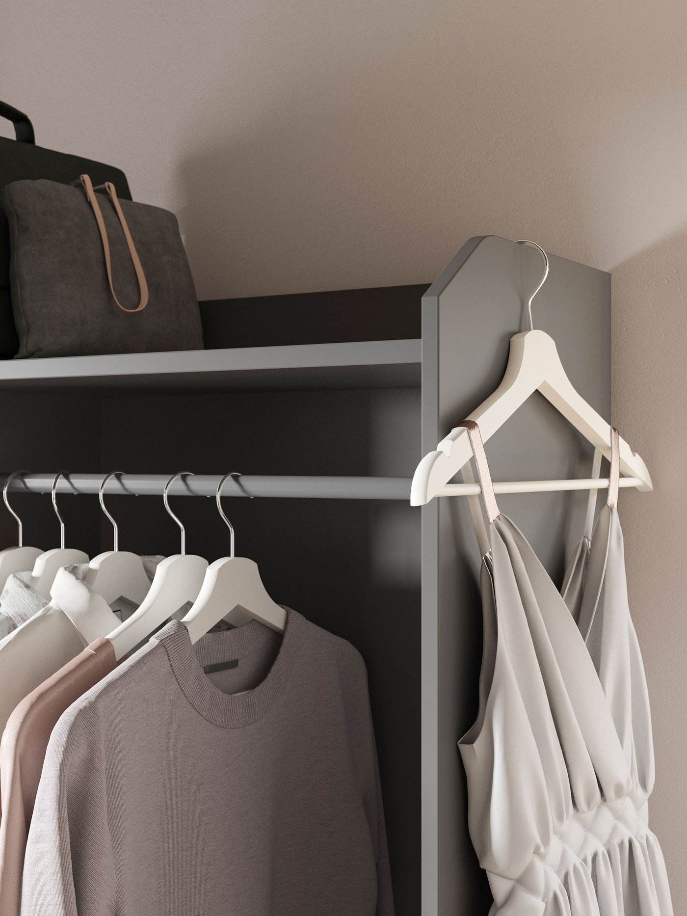 Partie d'une armoire-penderie ouverte grise ouverte HAUGA, avec des chemises suspendues en rangée et un seul cintre avec une robe suspendue sur le bord supérieur.