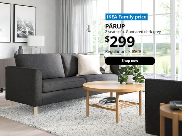 PARUP dark grey sofa in living room. Text on image reads 