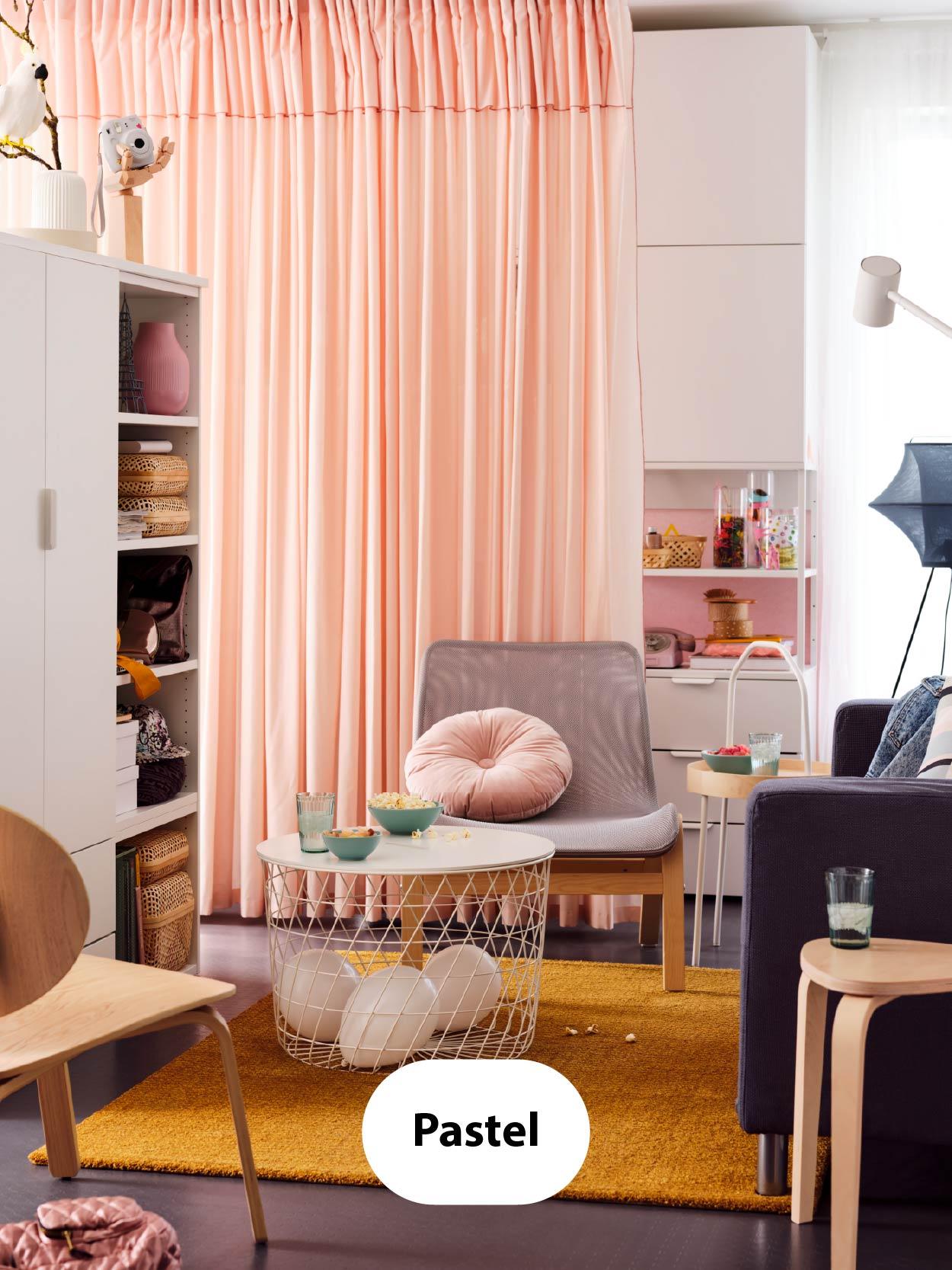 Pastel – Cozy living space with peach curtains, pastel pink cabinet, soft-toned cushions, and a warm mustard rug.
